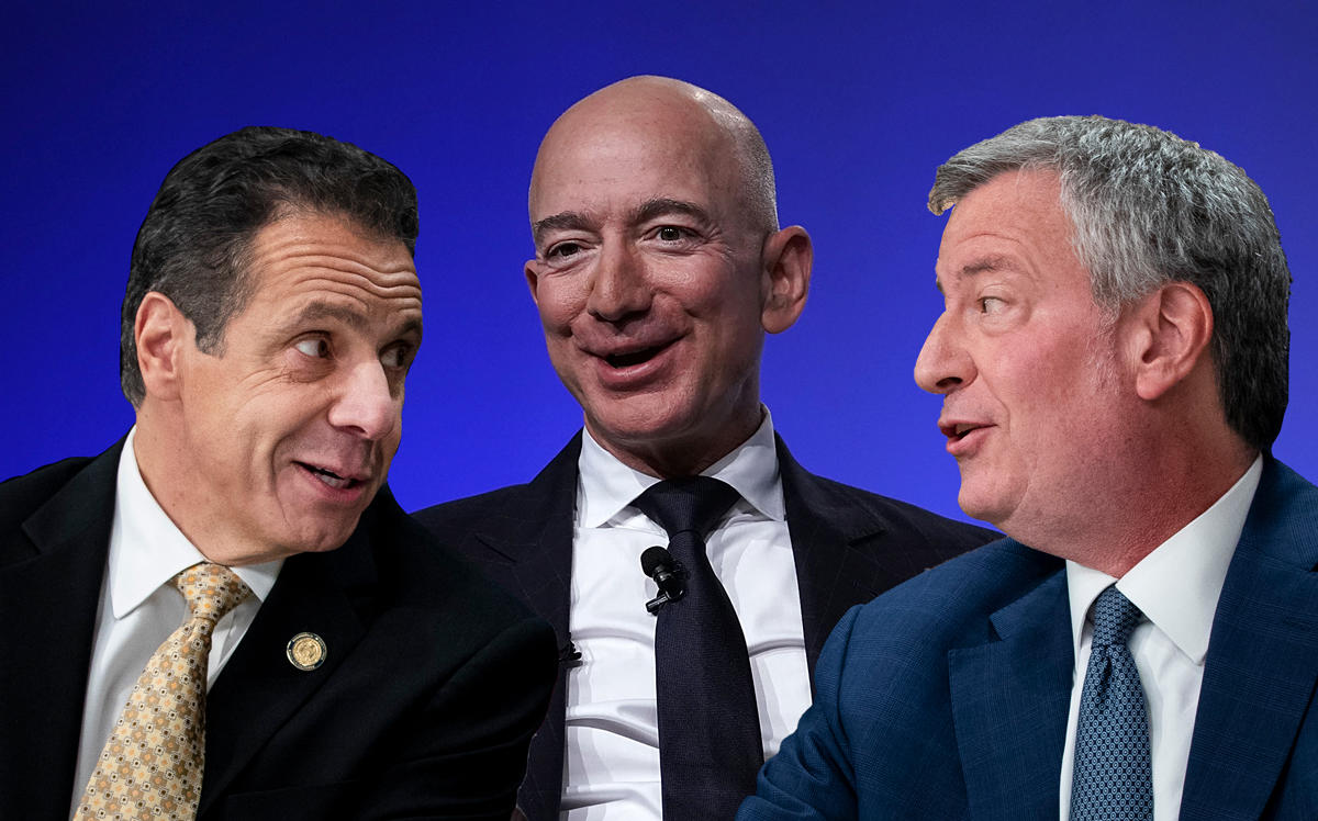 From left: Governor Andrew Cuomo, Jeff Bezos, and Mayor Bill de Blasio (Credit: Getty Images)