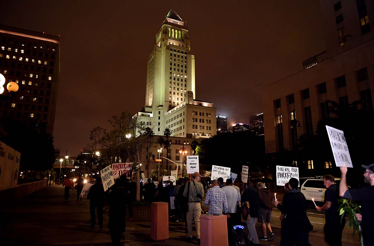 Housing and homeless advocates mourn the destruction of the Parker Center, the former L.A. police headquarters. (Credit: Getty Images)