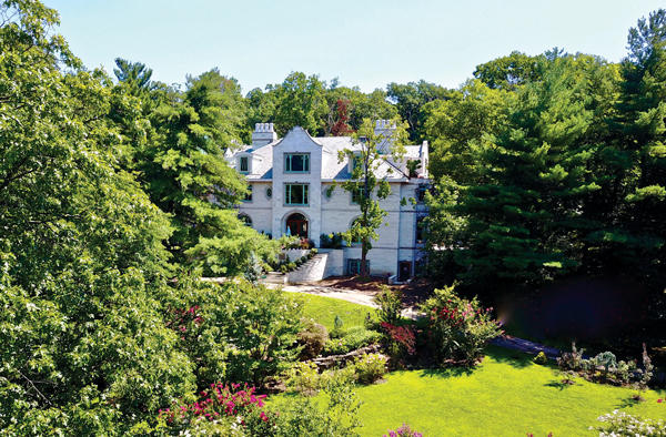 The seven-bedroom, 12-bath home at 14 Old Quarry Road is listed for $9.9M with Igor Beyder of Beyder and Company.