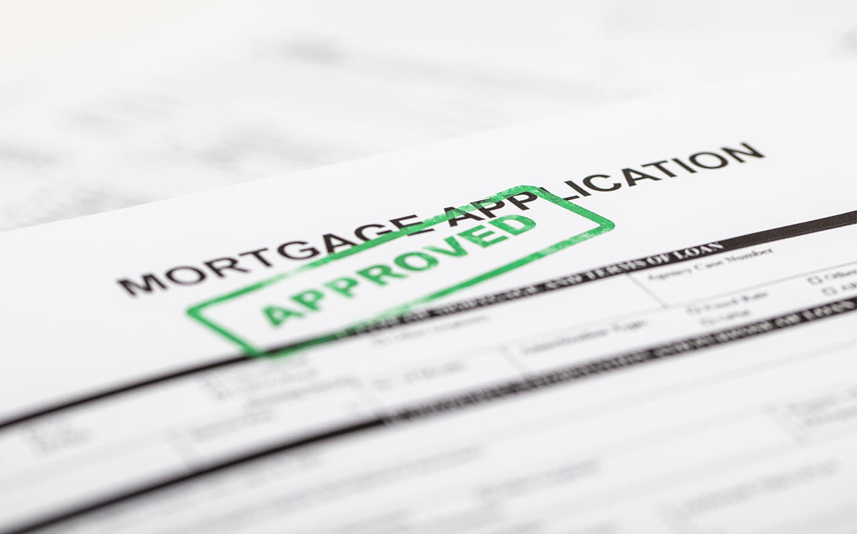 Approved mortgage papers (Credit: iStock)