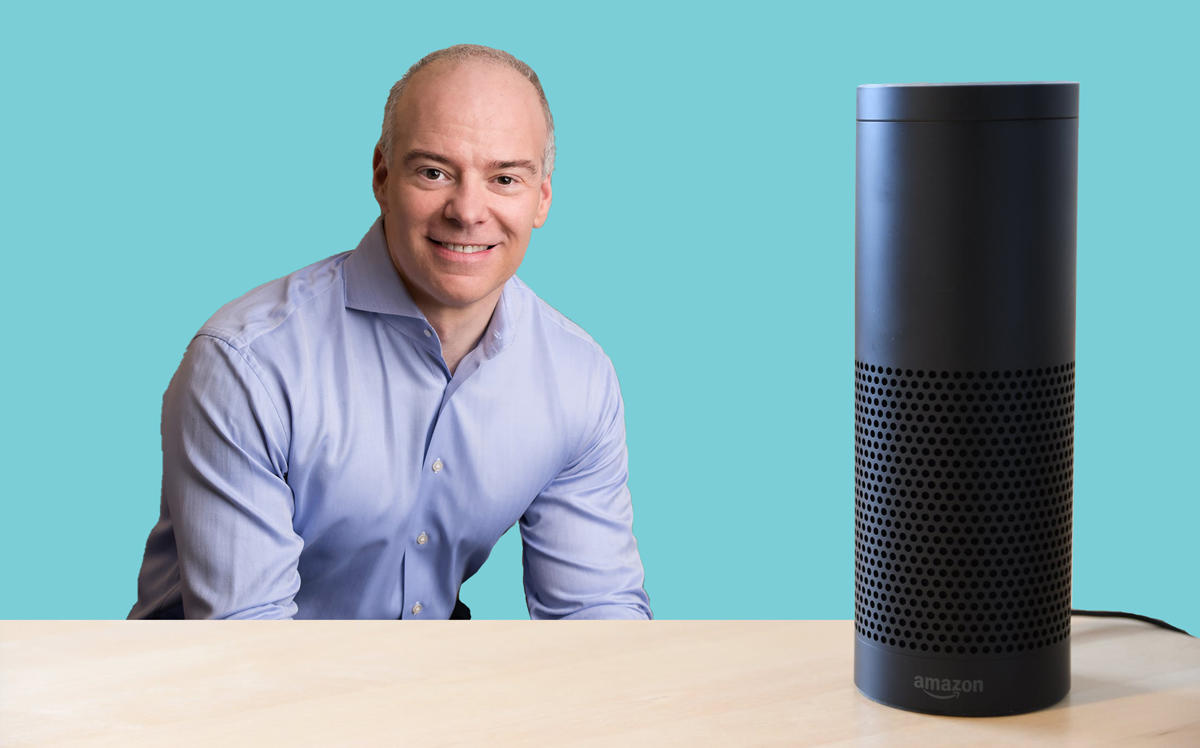 Realogy CEO Ryan Schneider with an Amazon Alexa (Credit: Pexels)