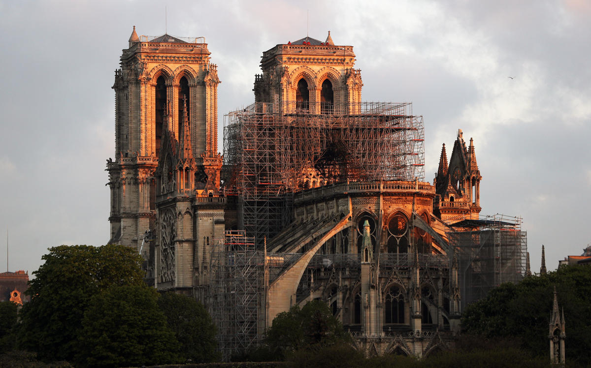 Notre-Dame Cathedral seen at sunrise following the major fire (Credit: Getty Images)