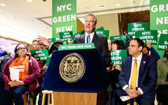 Mayor Bill de Blasio seen speaking during a Green New Deal rally last spring (Credit: Getty Images)