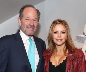 Eliot Spitzer and Roxana Girand (Credit: Getty Images)
