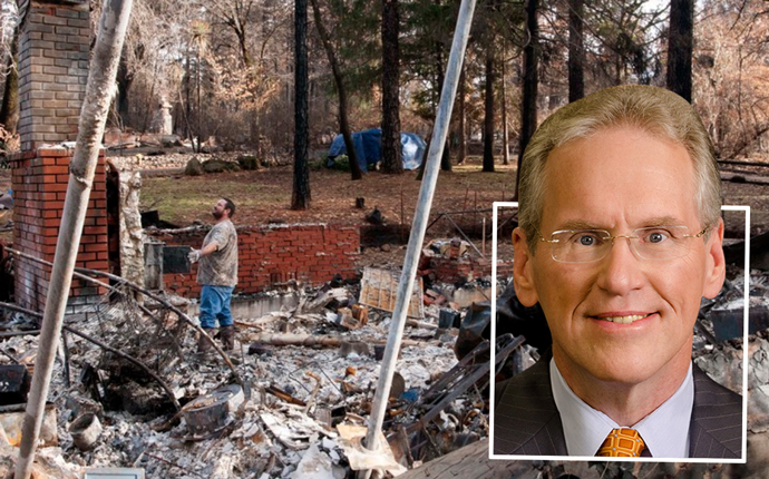 PG&E CEO William Johnson and a Camp Fire victim looking over his destroyed home (credit: U.S. Air Force)