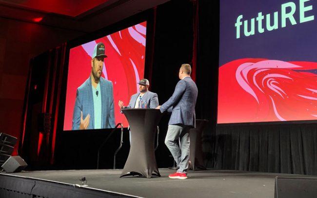 Jeff Cohn and Josh Team, president of KW, on/stage at futuRE