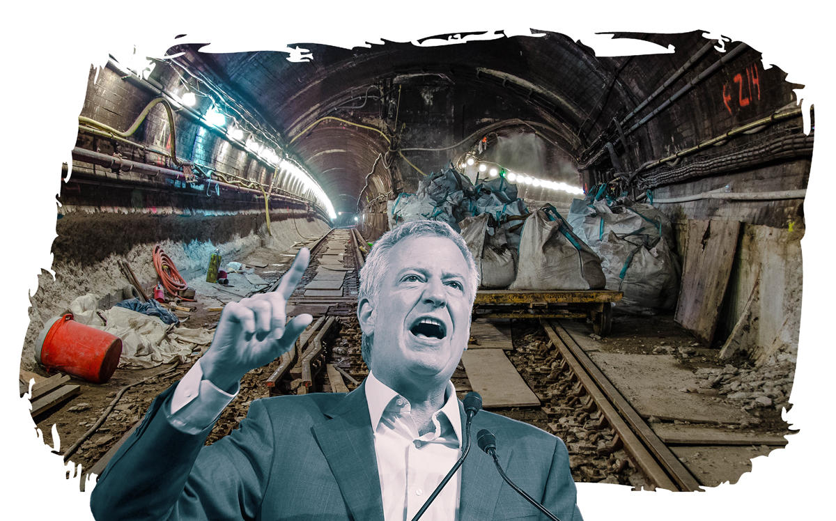 Mayor Bill de Blasio and subway damage caused by Hurricane Sandy (Credit: Getty Images)