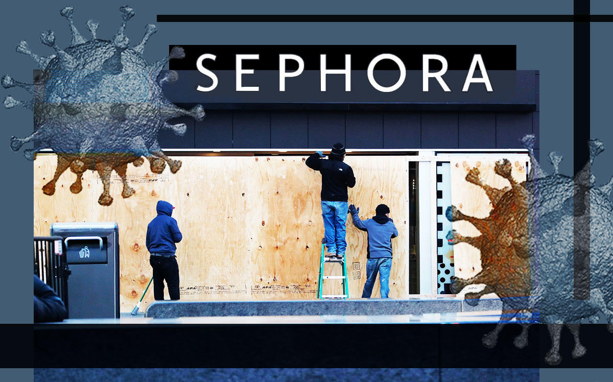 Workers board up the Time Square Sephora location (Credit: Liao Pan/China News Service via Getty Images)