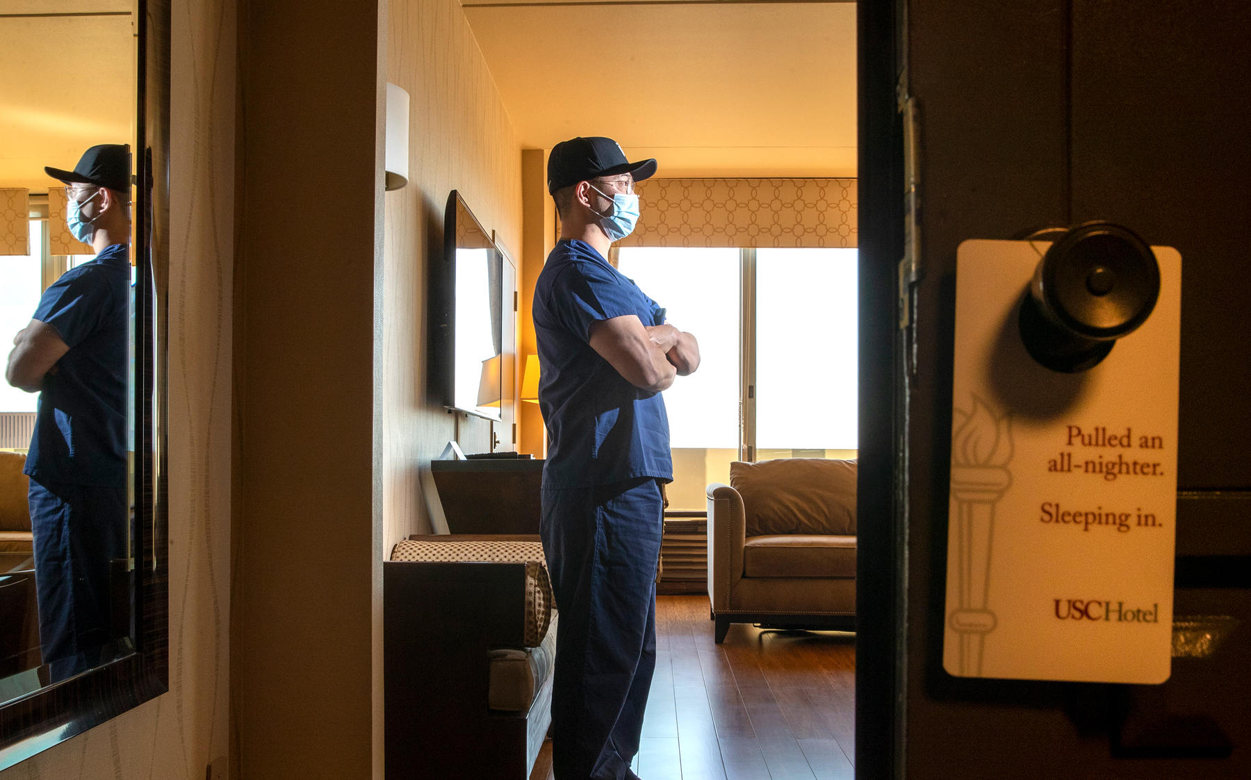 An essential worker staying at USC Hotel in Los Angeles (Credit: Robert Gauthier / Los Angeles Times via Getty Images)