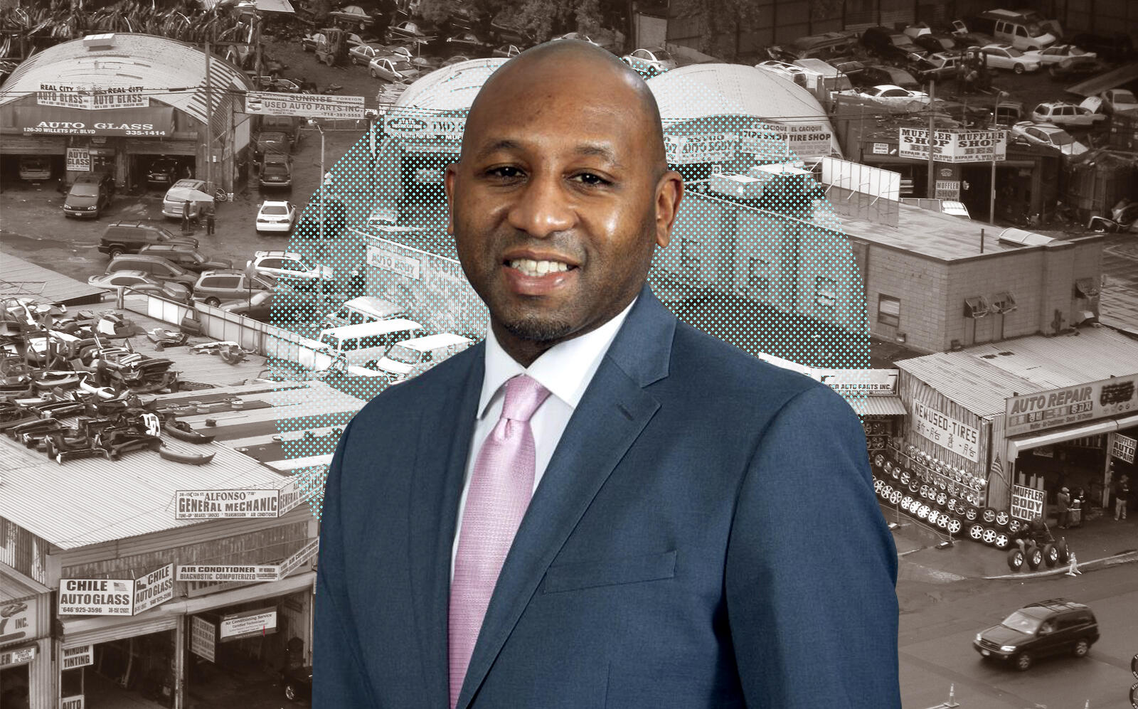 Queens Borough President Donovan Richards in front of Willets Point. (Office of Queens Borough President, WikiMedia / Jim.henderson)