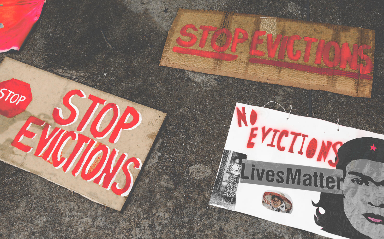 Signs from a protest in San Jose earlier this year to halt eviction proceedings (Getty)