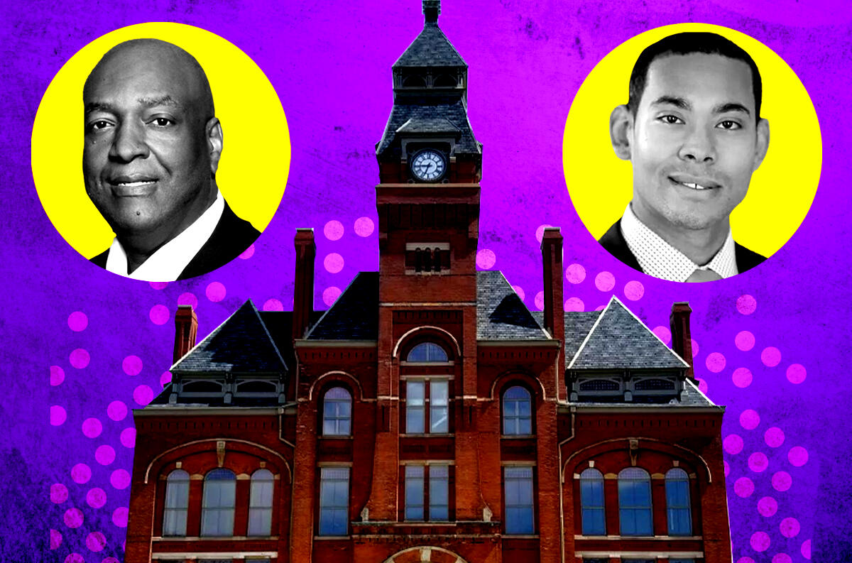 Andre Garner and Yellow Banana's Michael Nance with Pullman clock tower