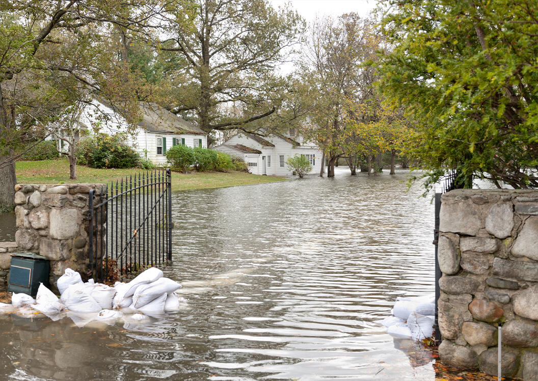 <em>A flooded house in an oceanside community in New England following Superstorm Sandy (iStock)</em>