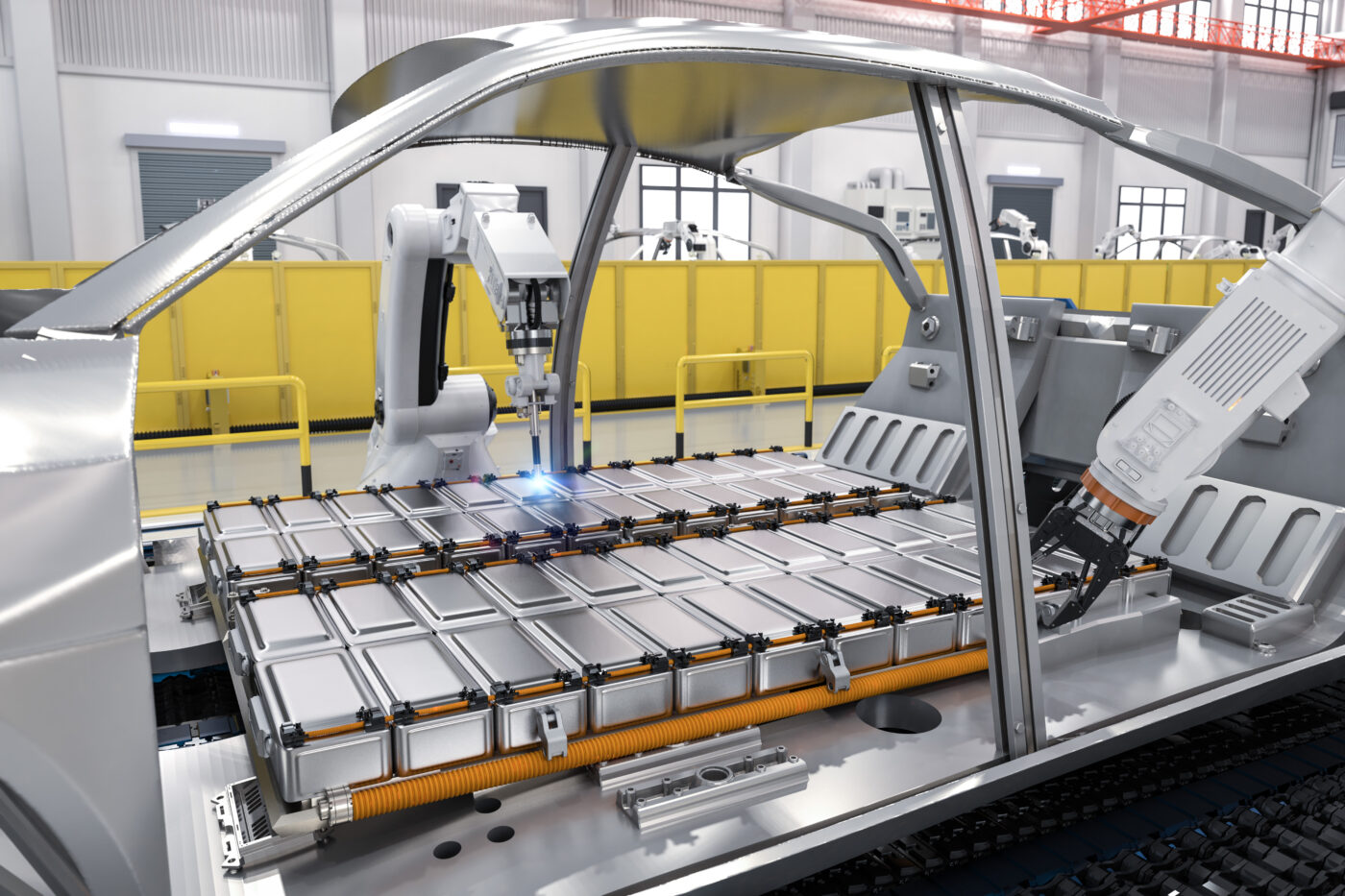 Automation automobile factory concept with 3d rendering robot assembly line with electric car battery cells module on platform (Getty Images)