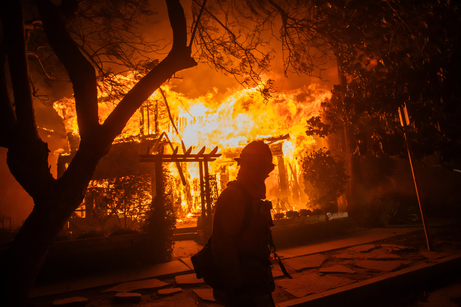 Fires whipped by 99 mph gusts destroy Southern California homes, businesses