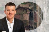 Cresa’s Jim Hazard and the 209-acre agricultural field across from the airport on Hwy 289