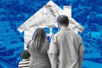 Young home buyers in front of house cut out